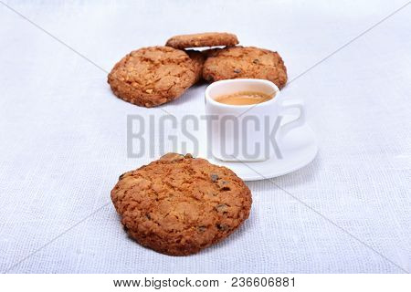 Classic Espresso In White Cup With Cake And Chocolate On White Background