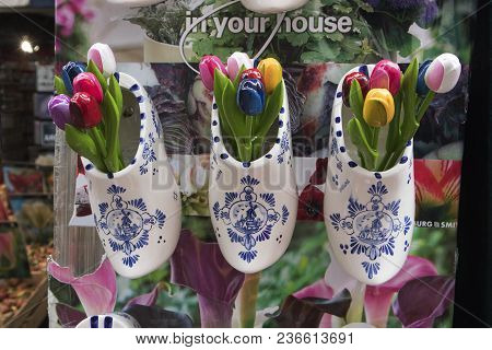 Souvenirs At Bloemenmarkt -floating Flower Market- On Singel Canal. Amsterdam. Netherlands