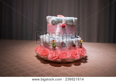 Cake Of Diapers, Baby Shower Gift Diaper, Wrapped Diapers, A Roll Of Diapers, Wrapped A Clean Diaper