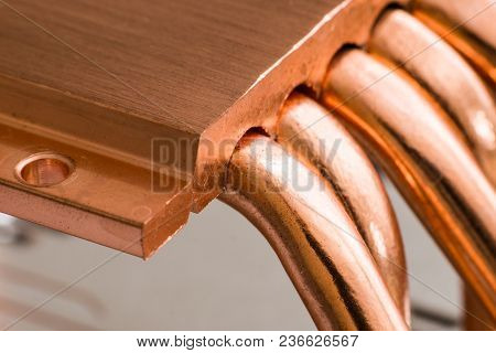 Aluminum Radiator With Copper Heat Pipe Close-up With Beautiful Bokeh Metallic Background