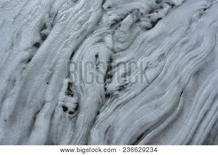 Snow Pushed To One Side Of Unalaska Lake, Alaska.