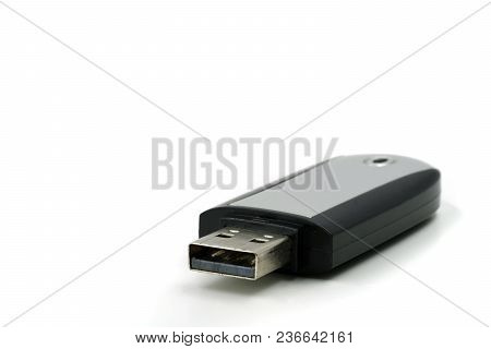 Portable Usb Stick Drive Memory With Shadow Reflected On White Background