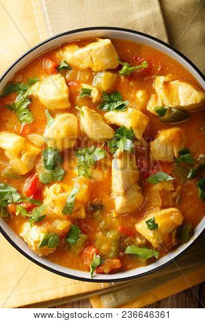 South American Food: Bobo Chicken Stew With Vegetables In Coconut Milk Close-up. Vertical Top View