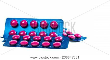 Ibuprofen In Pink Tablet Pills Pack In Blue Blister Pack Isolated On White Background With Copy Spac