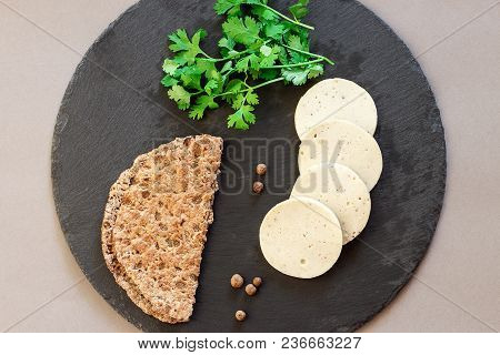 Dietary Homemade Chicken Mortadella With Allspice On Slate Board. Protein Rye Multicereal Flatbread.
