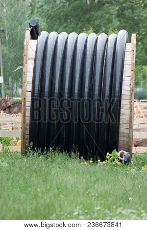 Polyethylene Pipes In The Coil For Gas And Water Are Liyng On The Ground. Repair Works.