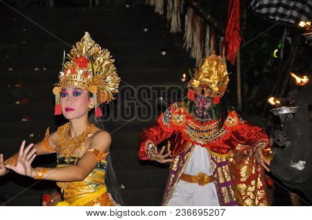 Ubud, Bali, Indonesia, July 2017 The Performance Kecak Fire Dance Show With One Man And Woman.