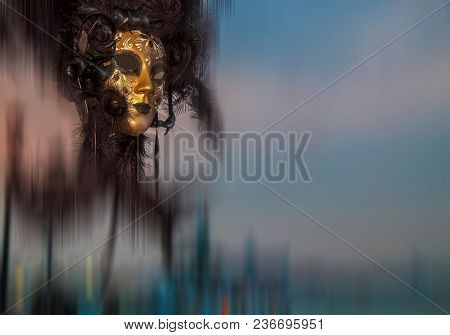 An Unidentified Mask Attends At The Carnival Of Venice. Motion Blur Filter Applied.