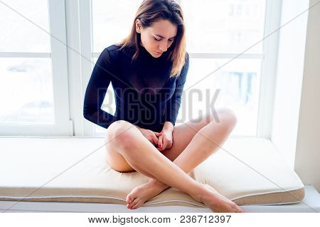A Portrait Of A Beauriful Woman In A Lingerie