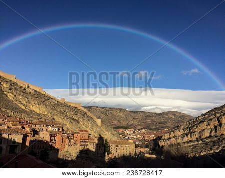Southern Spain Little Town Of Albarracin Above The Clouds And With A Rainbow