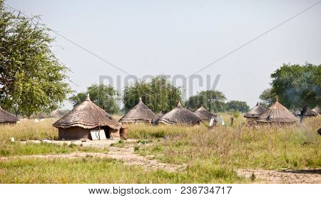 Village of grass huts in remote area of South Sudan.