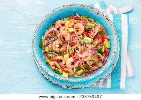 Mexican Food. Mexican Shrimps Ceviche Sebiche With Tomatoes And Avocado In Blue Bowl, Wooden Blue Ba
