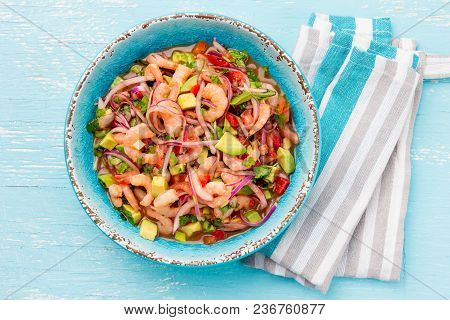 Mexican Food. Mexican Shrimps Ceviche Sebiche With Tomatoes And Avocado In Blue Bowl, Wooden Blue Ba