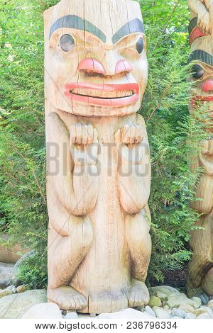 Indian Totem Poles In Capilano Suspension Bridge In Vancouver, Canada
