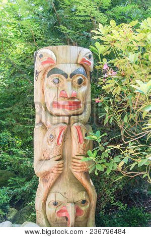 Indian Totem Poles In Capilano Suspension Bridge In Vancouver, Canada