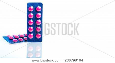 Ibuprofen In Pink Tablet Pills Pack In Blue Blister Pack Isolated On White Background With Copy Spac