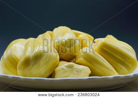 Fresh Jackfruit Slices On A White Plate. Sweet Yellow Jackfruit Ripe. Vegetarian, Vegan, Raw Food. E