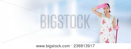 Cleaner tired with mop with bright background