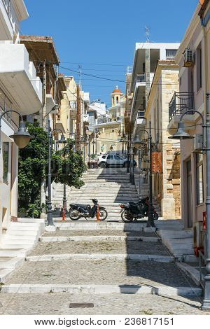 Sitia, Crete, Greece, June 11, 2017: Street With Steps In Sitia Town, Crete Island, Greece
