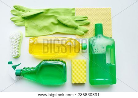 Cleaning Products On White Table, View From Above