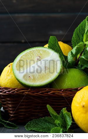 Fresh Citrus And Mint In A Wooden Basket