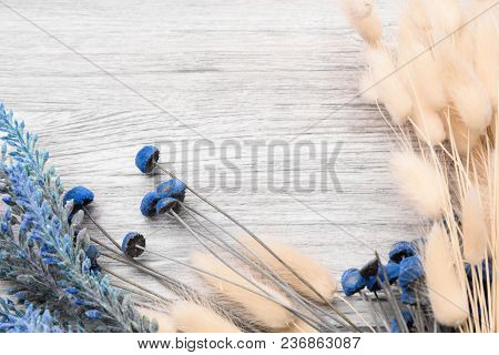 Wooden Background With A Frame Of Dried Flowers, With A Place For Your Text
