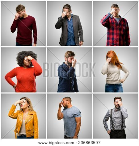 Group of mixed people, women and men with sleepy expression, being overworked and tired, rubbes nose because of weariness
