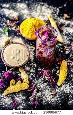 Ayurvedic Ubtan Of Haldi With Holy Rose Water And Fuller’s Earth On Wooden Surface For Good, Brighte