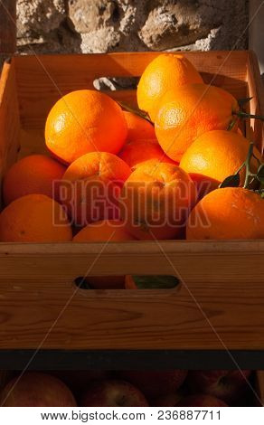 Orange And Apple Fruits In A Natural Box