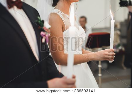 Wedding Couple Bide And Groom Get Married In A Church.