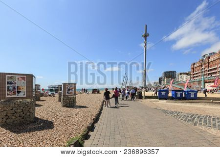 Brighton, United Kingdom - August 1, 2017: Tourists Admire The Amazing View Of English Channel And T