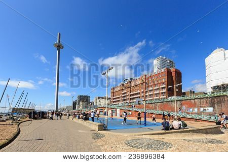 Brighton, United Kingdom - August 1, 2017: Tourists Admire The Amazing View Of English Channel And T