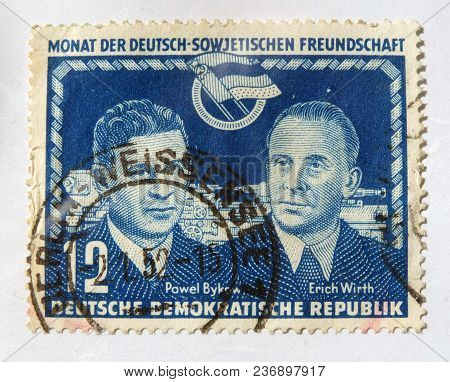 Leeds, England - April 18 2018: An Old Blue East German Postage Stamp With An Image Celebrating Germ