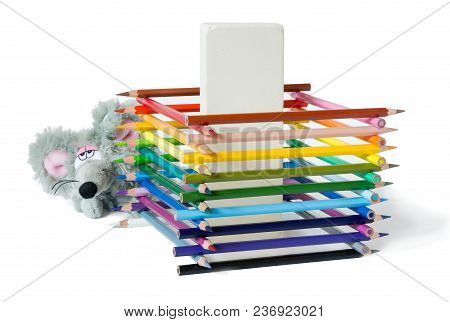 Set Of Colored Pencils Protect Giant Eraser From Sly Toy Mouse.