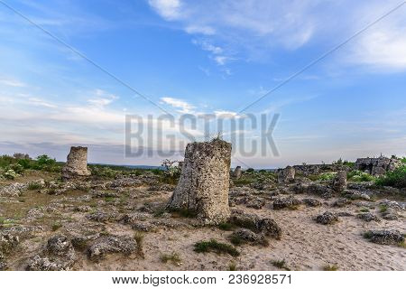 Magnificent Landscape Of Abstract Stones On A Hill At Sunset.