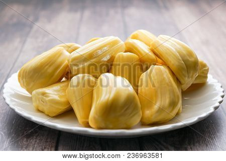 Fresh Jackfruit Slices On A White Plate. Sweet Yellow Jackfruit Ripe. Vegetarian, Vegan, Raw Food. E
