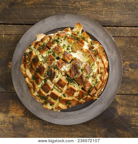 Pull Apart Bread Filled With Cheese And Garlic Butter And Herbs