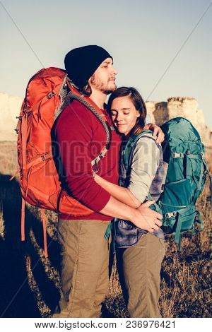 Couple hiking together in the wilderness
