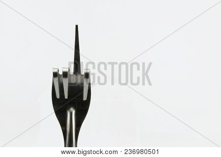 Folding Fork As A Symbol Of Digitus Infamis (fuck You) Isolated On White Background.