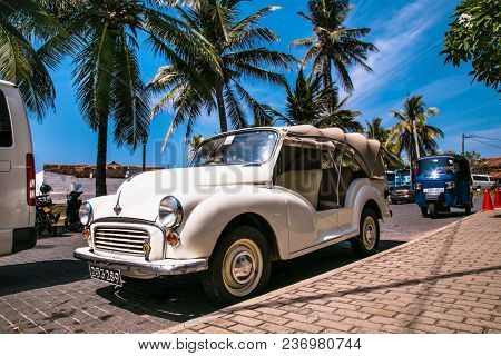 GALLE SRI LANKA - JAN 6, 2017: The Morris Minor cabriolet old timer car in the street of old Fort on Jan 6, 2017 in Galle city. Sri Lanka.