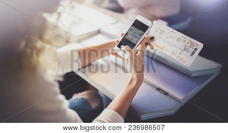 Enjoying Business Travel Concept. Young Beautiful Brunette Tourist Girl Travelling On The Train Sitt
