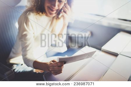 Enjoying Business Travel Concept. Young Beautiful Brunette Tourist Girl Travelling On The Train Sitt
