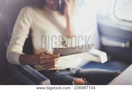 Enjoying Business Travel Concept. Young Beautiful Brunette Tourist Girl Travelling On The Train Sitt