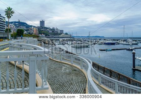 Atami, Japan - October 18, 2019: View Of The Beach Promenade, With Visitors, In Atami, Izu Peninsula