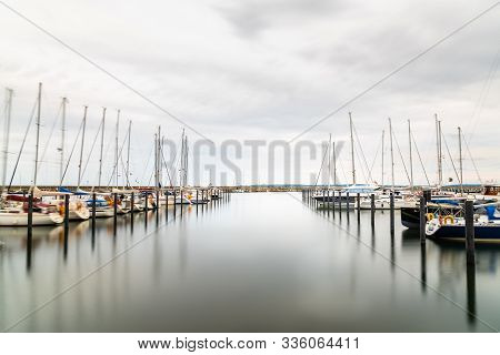 Sassnitz, Germany - August 1, 2019: Scenic Long Exposure View Of Sailing Boats Moored In The Harbour