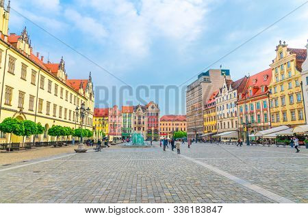 Row Of Colorful Traditional Buildings With Multicolored Facades, New City Hall, Glass Fountain On Ry
