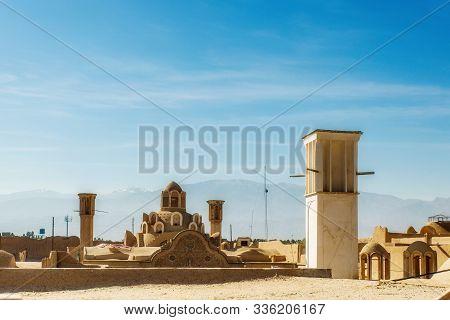 Panoramic Roof View Of The City Of Kashan, Iran. Historic Buildings Domes And Windcatchers On The Ba