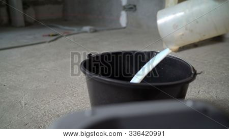 The Primer Is Diluted With Water. The Primer Is Diluted With Water Using A Flask. Priming The Floor.