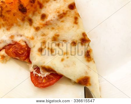 Restaurant On The Pier. A Piece Of Pepperoni Pepper On A Plate