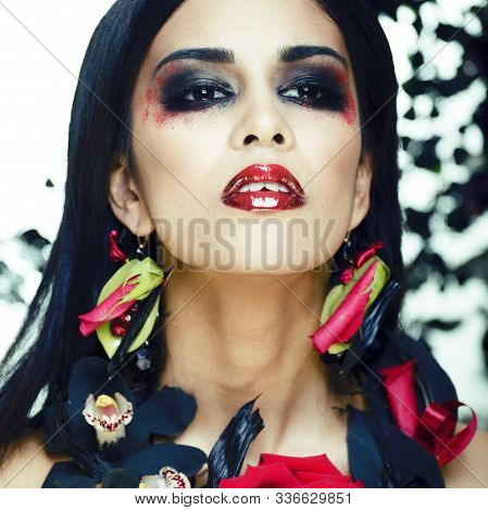 Pretty Brunette Woman With Rose Jewelry, Black And Red, Bright Make Up Kike A Vampire Closeup Red Li